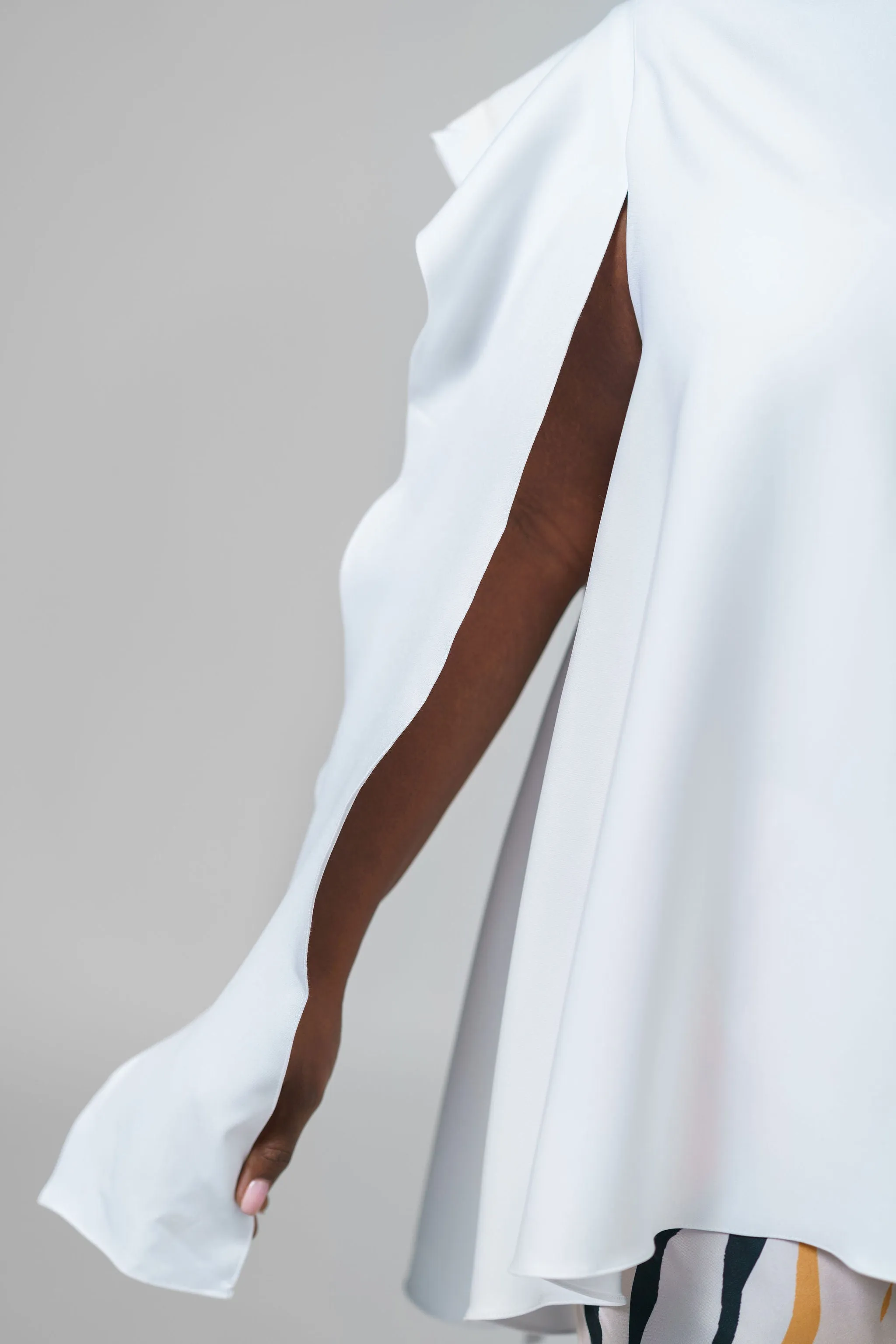 BLOUSE with FLOWY SIDE
