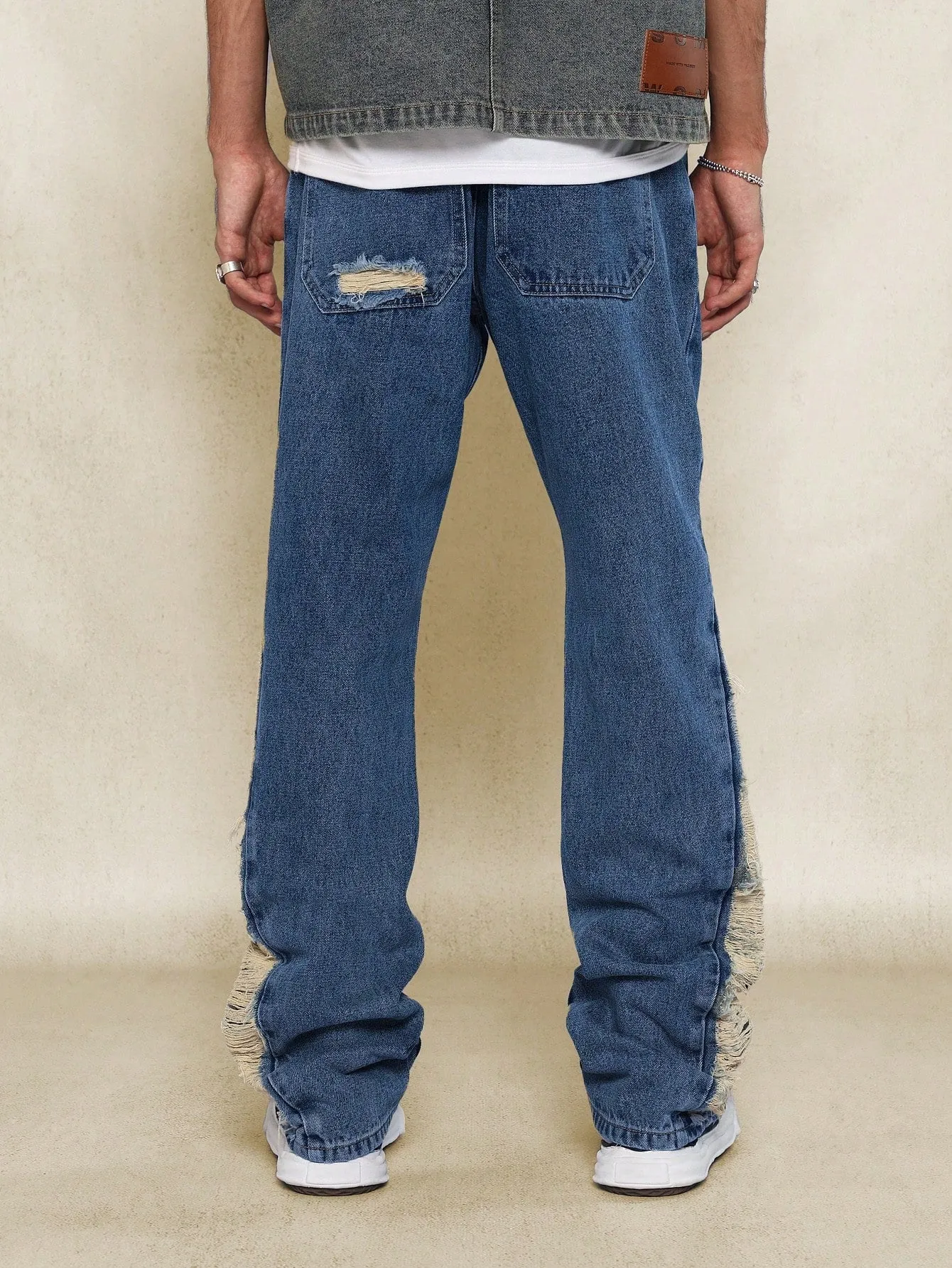 Flare Fit Distressed Denim Jean