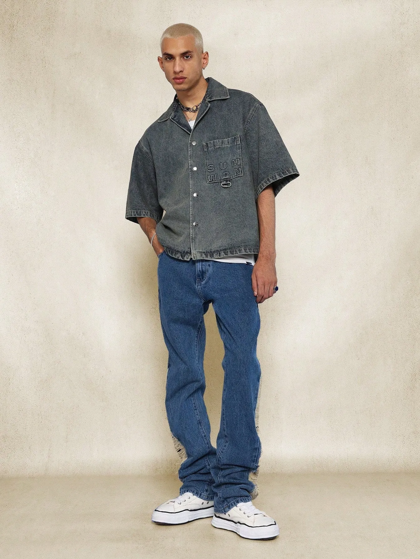 Flare Fit Distressed Denim Jean